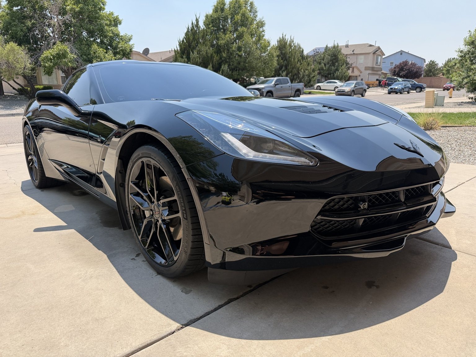 Black Corvette C7 with a deep gloss finish after detailing