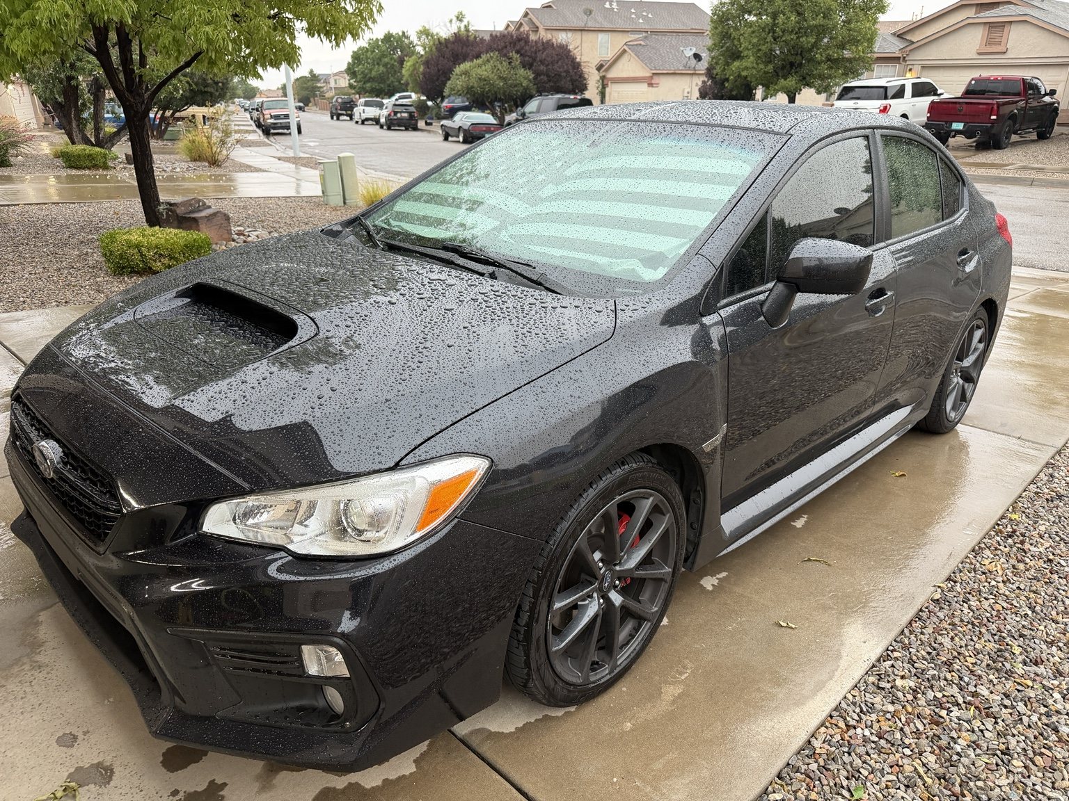 Black Subaru WRX exterior with clean paint, glass, wheels, and tires